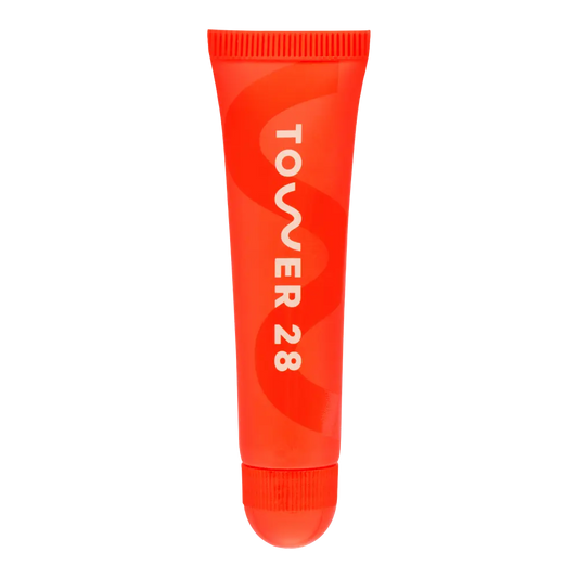 The Tower 28 Beauty LipSoftie™ Lip Treatment in the shade SOS Vanilla. [SOS Vanilla]